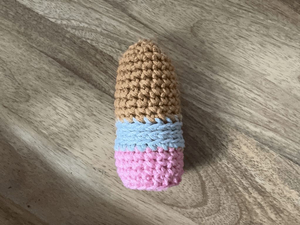 Completed base of the crochet pencil gnome